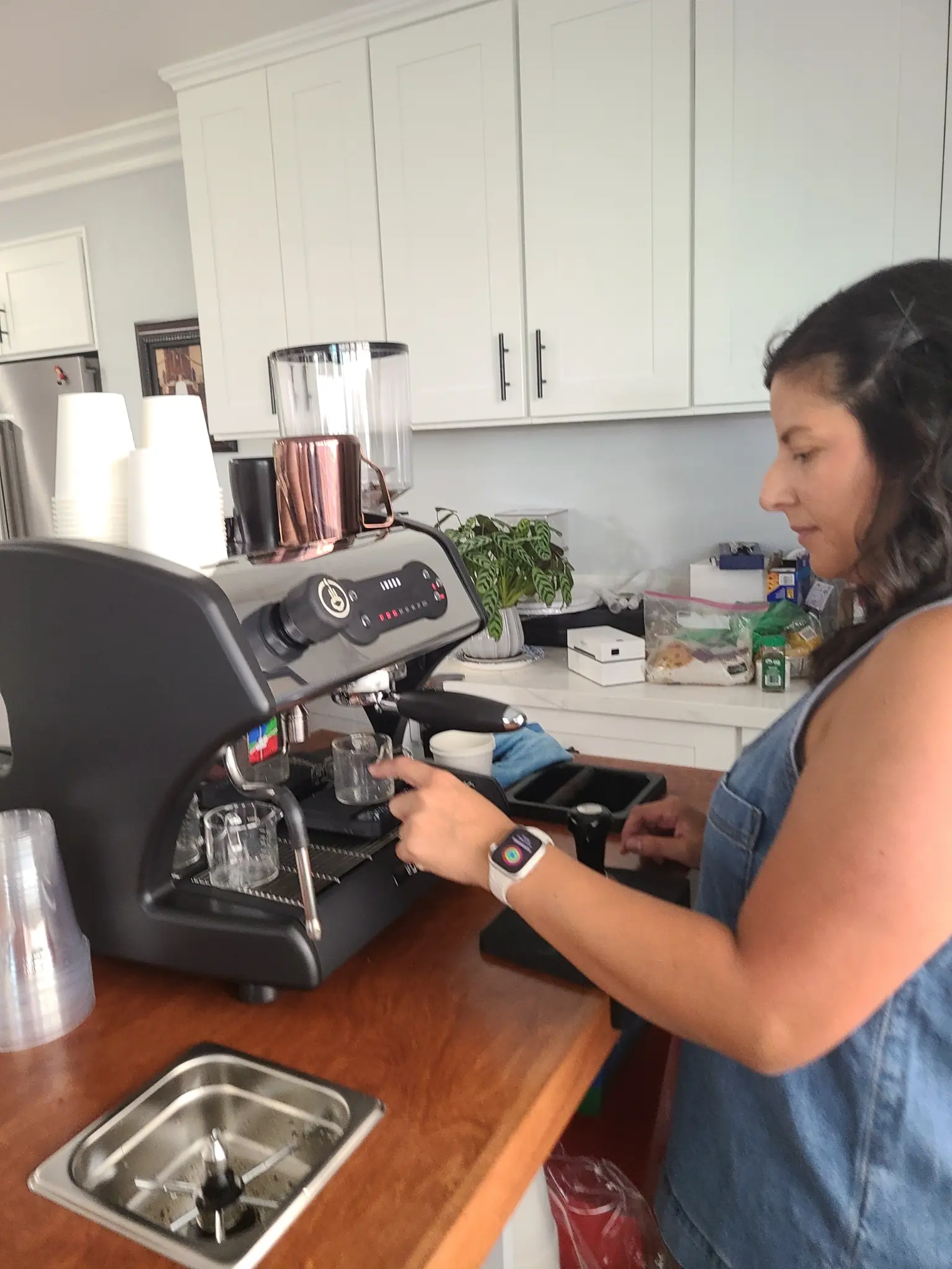 Jacky Alonso, founder of Run Wild Coffee, crafting espresso