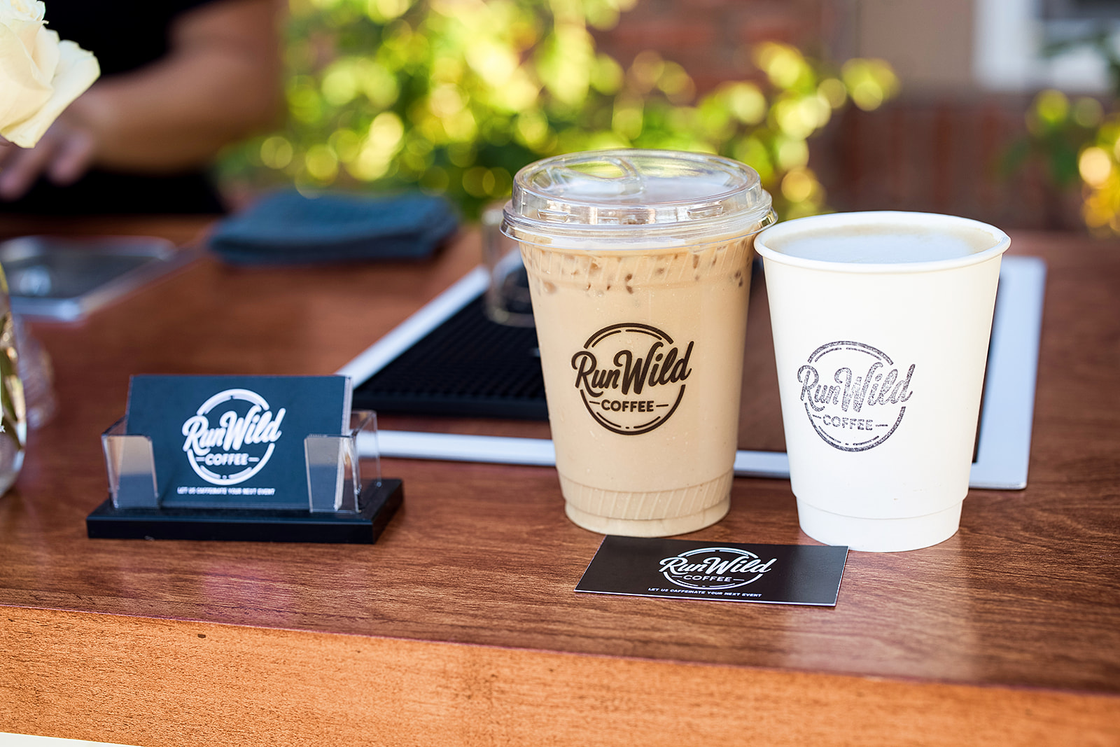 Latte being poured at Run Wild Coffee