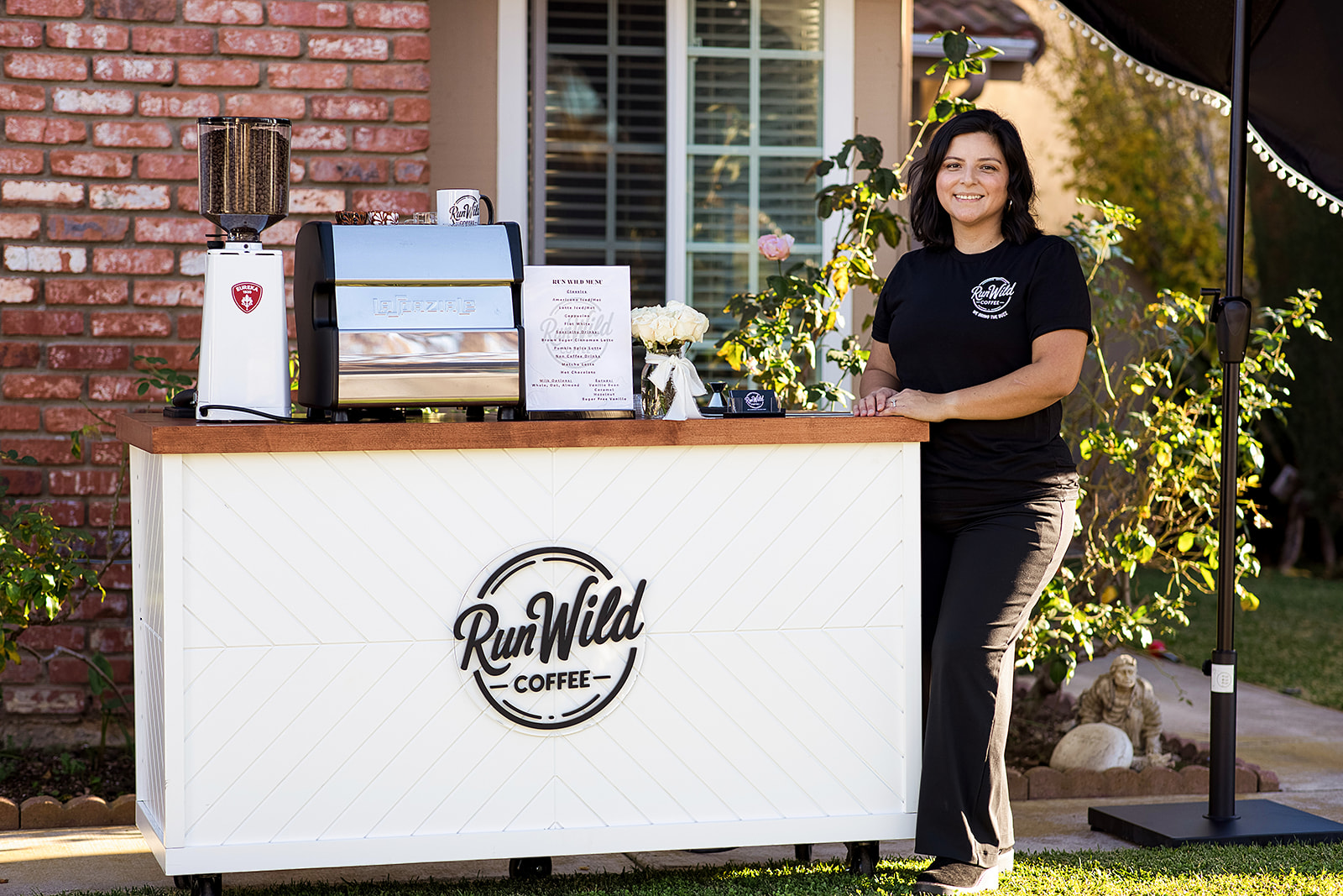 Run Wild Coffee owner smiling at an event